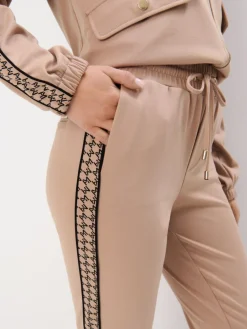 MOHITO Dresowe joggery z lampasami beu017cowy Fashion
