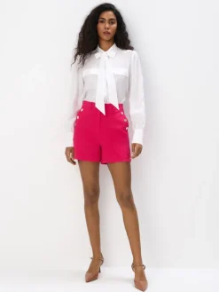 MOHITO Różowe szorty z ozdobnymi guzikami mocny ru00f3u017cowy Fashion